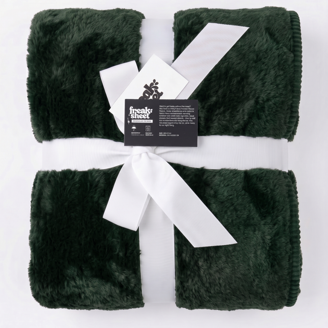 Forest colour luxury plush fleece sex blanket by Freak Sheet, neatly folded with a white gift ribbon, highlighting its soft and cosy finish.