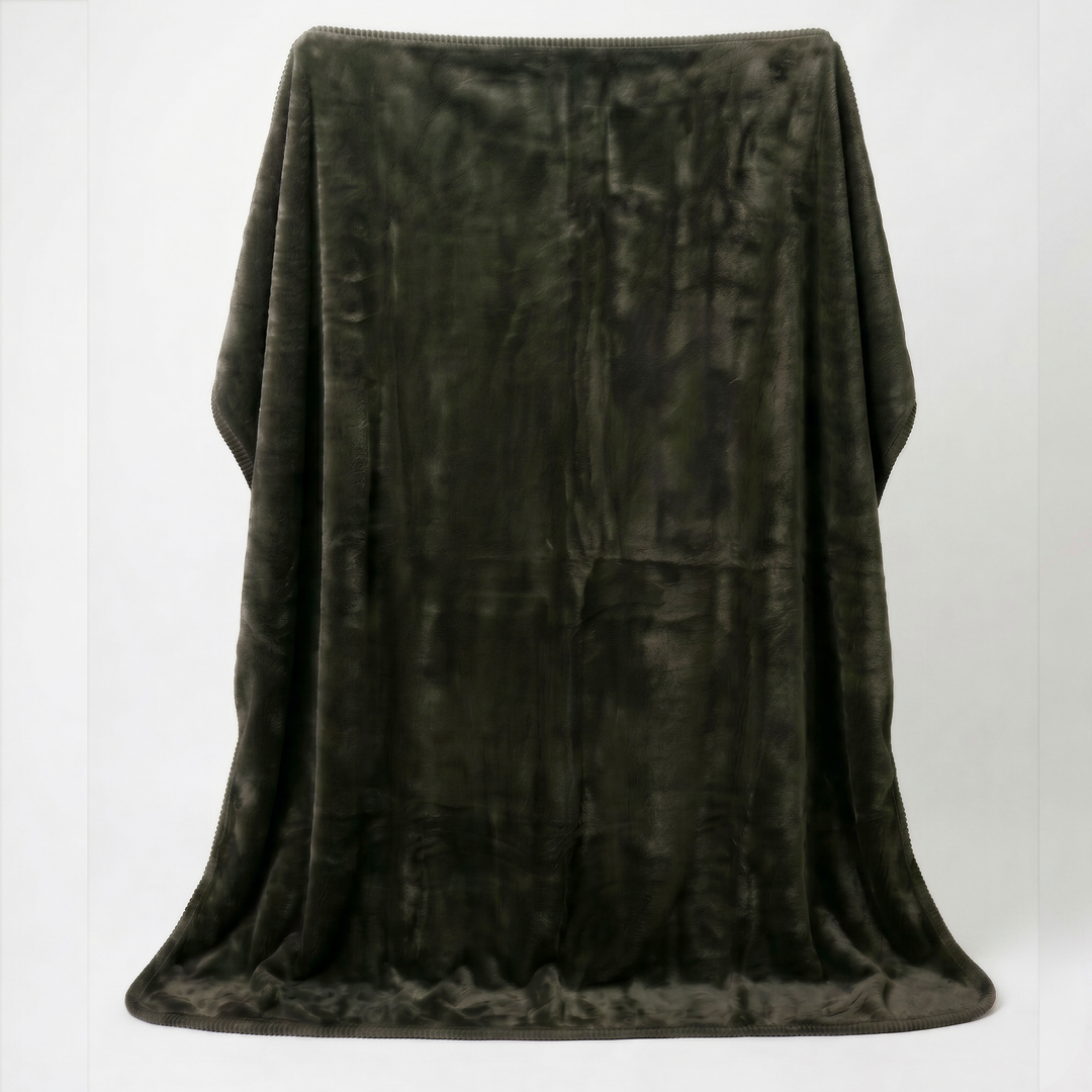 Forest colour luxury plush fleece sex blanket displayed draped over a white background highlighting its deep green tone and velvety soft texture.