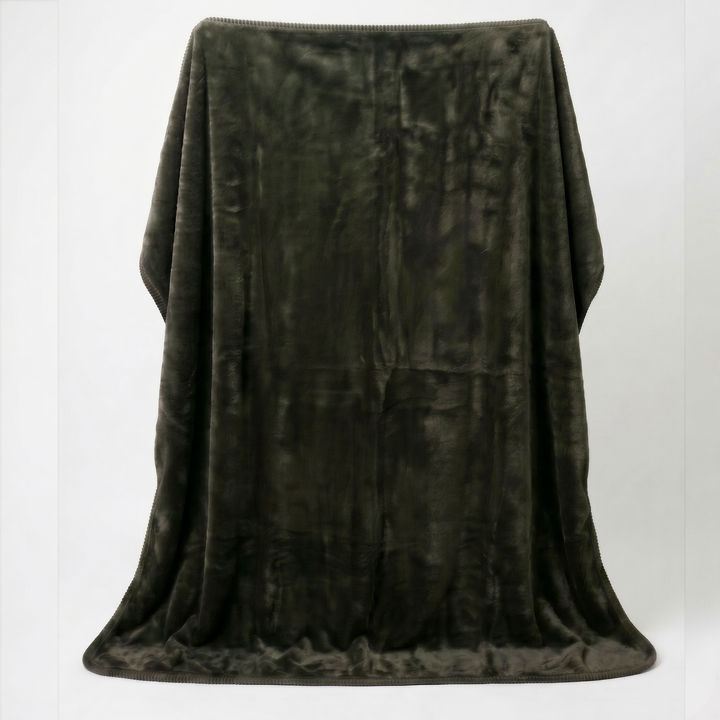 Forest colour luxury plush fleece sex blanket displayed draped over a white background highlighting its deep green tone and velvety soft texture.